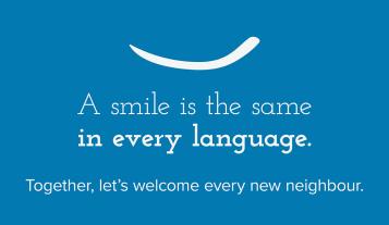 A smile is the same in every language. Together, let's welcome every new neighbour.